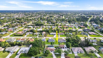 1665 SE Harp Ln in Port St. Lucie, FL - Foto de edificio - Building Photo