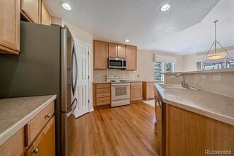 7969 S Buchanan Way in Aurora, CO - Building Photo - Building Photo