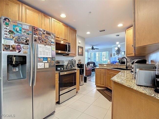 11971 Champions Green Way in Ft. Myers, FL - Foto de edificio - Building Photo