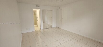 9001 Wiles Rd in Coral Springs, FL - Building Photo - Building Photo
