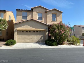 6064 Secret Island Dr in Las Vegas, NV - Building Photo - Building Photo