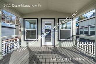 1411 Calm Mountain Pt in Woodland Park, CO - Building Photo - Building Photo