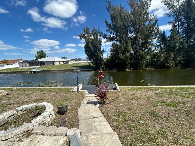 Freshly painted interior 2/2  spacious home on fresh water canal