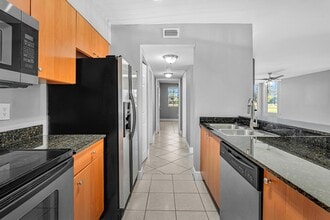 2881 N Oakland Forest Dr in Oakland Park, FL - Building Photo - Building Photo