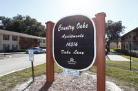 Country Oaks Apartments in Tampa, FL - Building Photo - Building Photo