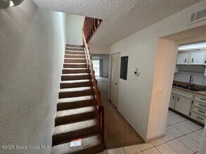 1030 Pine Tree Dr in Indian Harbour Beach, FL - Foto de edificio - Building Photo