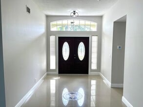 1112 Wild Cherry Ln in Wellington, FL - Building Photo - Building Photo