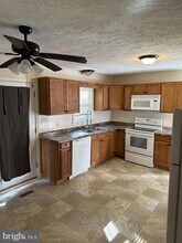 11653 Cowpoke Cir in Lusby, MD - Building Photo - Building Photo