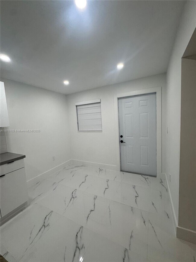 property at 9508 NW 26th St