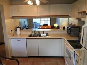 3021 Sandpiper Bay Cir-Unit -E305 in Naples, FL - Building Photo - Building Photo