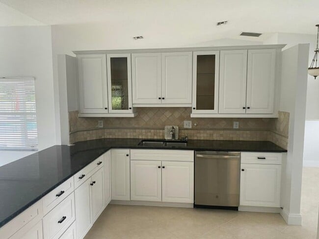 4593 Bucida Rd in Boynton Beach, FL - Building Photo - Building Photo