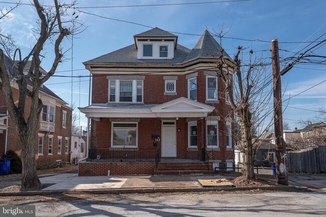 property at 122 E 3rd St