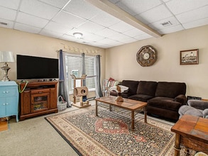 104 E Broadway Ave, Unit Apartment 1 in Scottville, MI - Building Photo - Building Photo