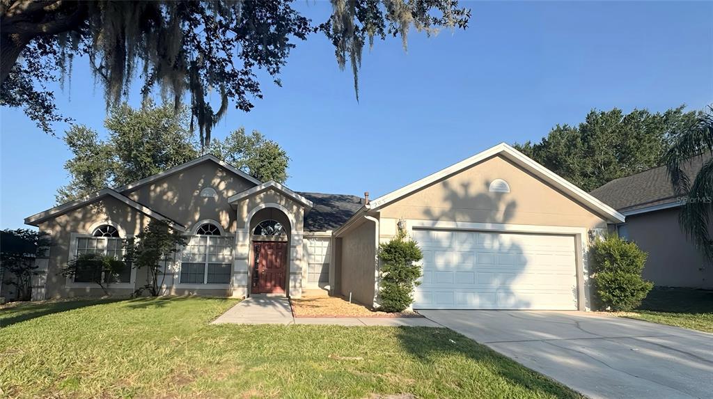 205 Greeley Loop in Davenport, FL - Building Photo