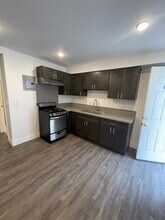 210 W 57th St, Unit 3/4 in Los Angeles, CA - Foto de edificio - Building Photo
