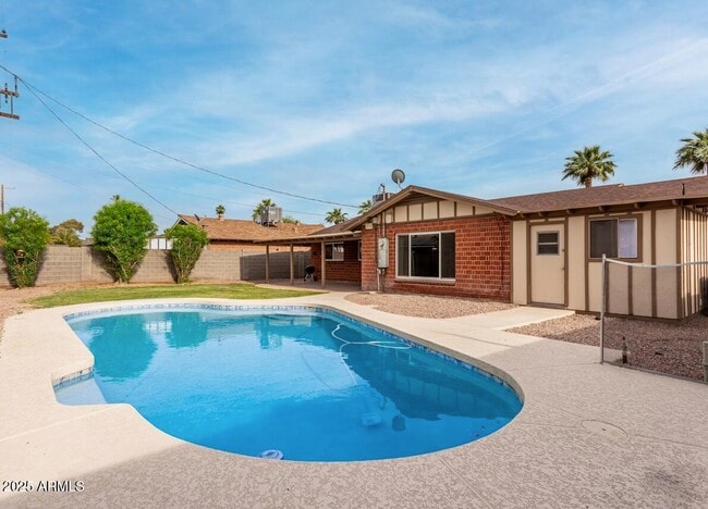 property at 8716 E Holly St