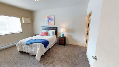 Stonebridge Villa Apartments & Townhomes in Minot, ND - Building Photo - Building Photo