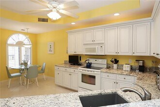 7048 Pelican Bay Blvd-Unit -C-302 in Naples, FL - Building Photo - Building Photo