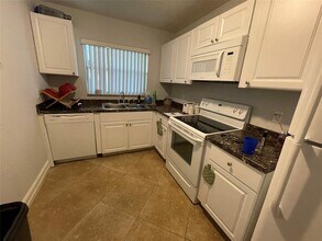 6075 N Sabal Palm Blvd, Unit 205 in Tamarac, FL - Building Photo - Building Photo