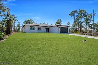 828 Genoa Ave S in Lehigh Acres, FL - Building Photo - Building Photo