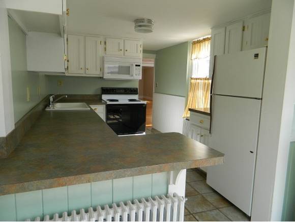 54 Bank St, Unit #1 in St. Albans, VT - Foto de edificio - Building Photo