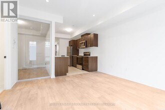155-155 Tapscott Rd in Toronto, ON - Building Photo - Building Photo