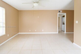 4951 Wedgewood Way, Unit 1 in West Palm Beach, FL - Building Photo - Building Photo