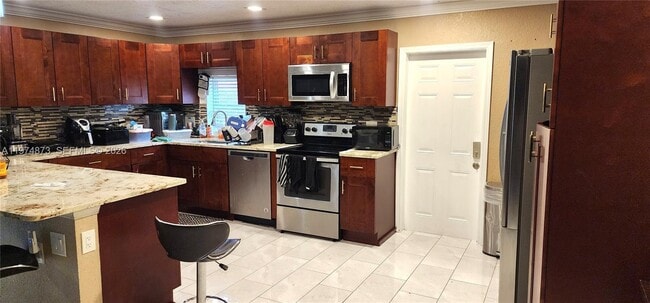 7707 SW 8th St in North Lauderdale, FL - Building Photo - Building Photo