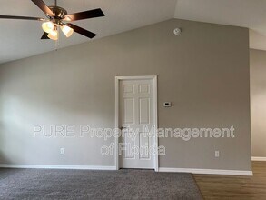 309 Malauka Run in Ocklawaha, FL - Building Photo - Building Photo