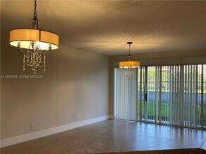 8801 Wiles Rd in Coral Springs, FL - Building Photo - Building Photo