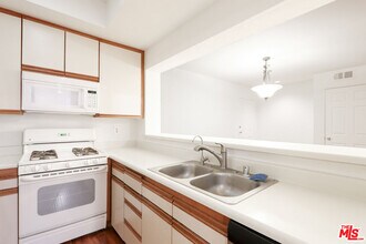 1440 Rexford Dr in Los Angeles, CA - Building Photo - Building Photo