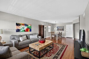 401 Golden Isles Dr in Hallandale Beach, FL - Building Photo