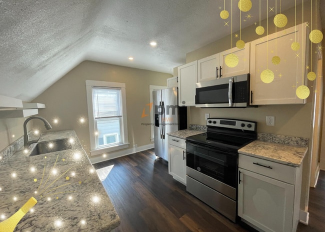 property at 1204 Manhattan St