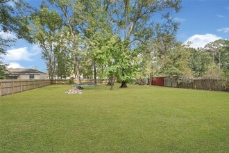 18565 Huckleberry Ln in Porter, TX - Building Photo - Building Photo