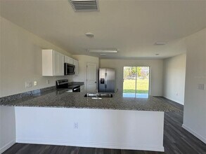 1242 Autumn St in Port Charlotte, FL - Building Photo - Building Photo