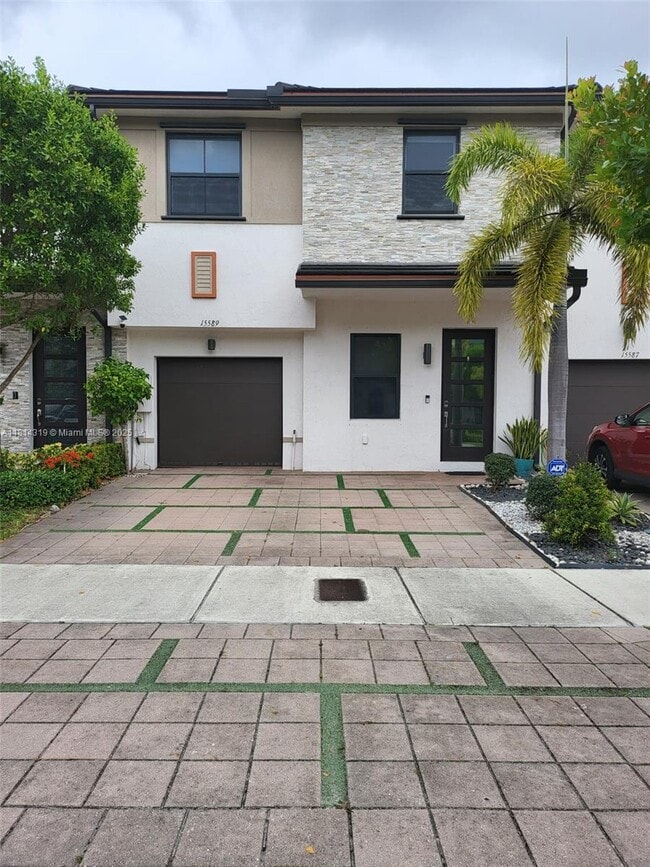 property at 15589 NW 91st Ct