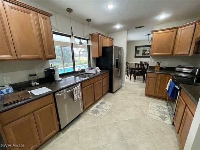 9871 El Greco Cir in Bonita Springs, FL - Building Photo - Building Photo