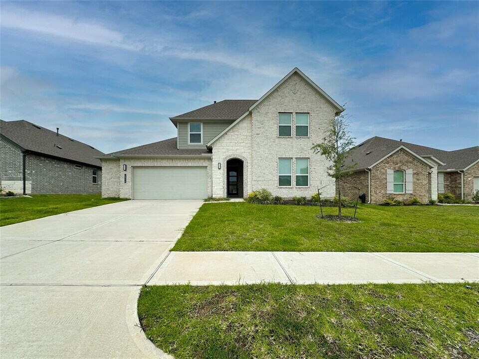 15216 Tattle Crk Ln in Shenandoah, TX - Building Photo