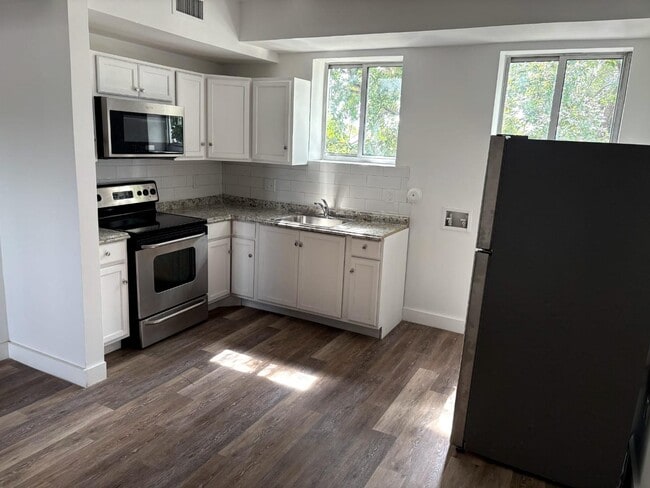 property at 6211 NW 7th Ave