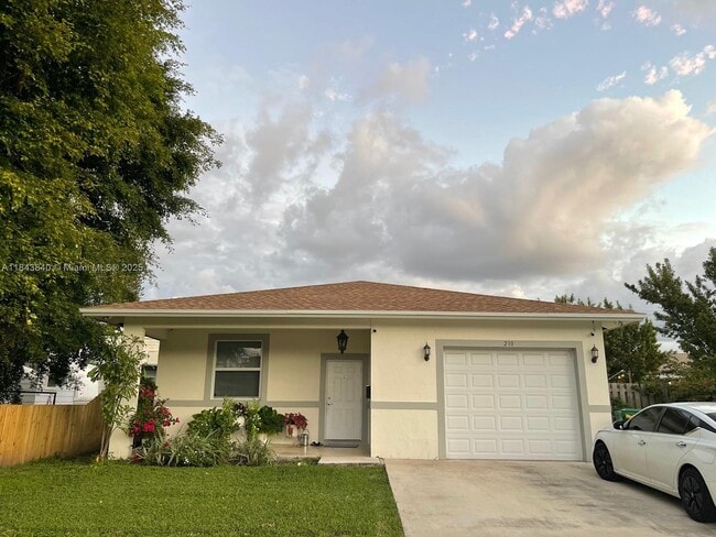property at 210 SW 4th St