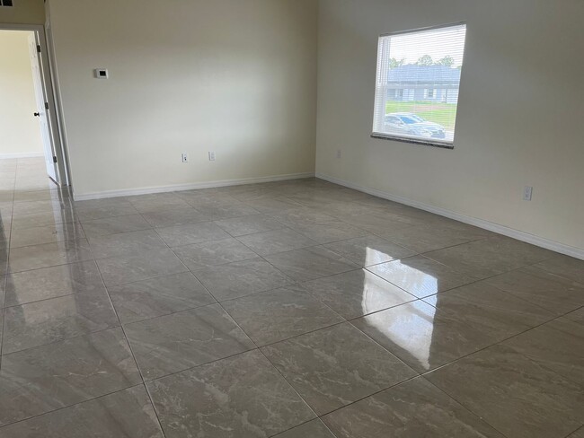 1135 Chiefland St E in Lehigh Acres, FL - Building Photo - Building Photo