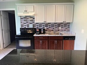 491 SW Curtis St in Port St. Lucie, FL - Building Photo - Building Photo