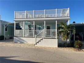 118 NE Bay Dr in Ocean Breeze, FL - Building Photo