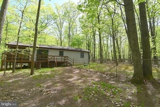 67 Tranquil Way in Great Cacapon, WV - Building Photo - Building Photo