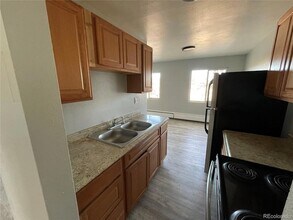 1590 Clinton St, Unit 202 in Aurora, CO - Foto de edificio - Building Photo