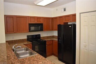 10126 Villagio Palms Way-Unit -205 in Estero, FL - Building Photo - Building Photo
