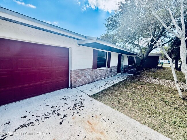 410 S Tropical Trail in Merritt Island, FL - Building Photo - Building Photo