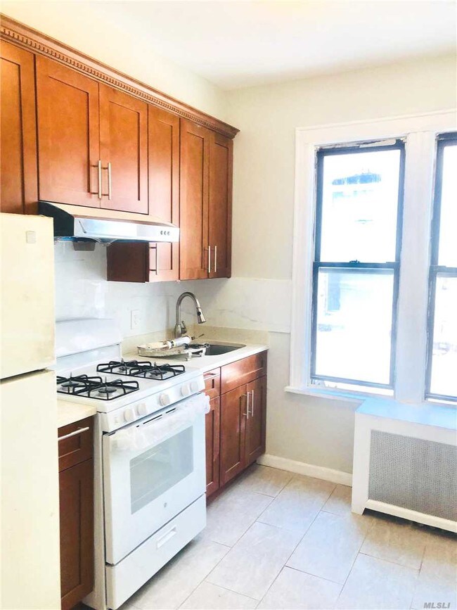 76-12 Woodside Ave-Unit -2A in Queens, NY - Building Photo - Building Photo