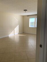 5031 Wiles Rd in Coconut Creek, FL - Building Photo - Building Photo