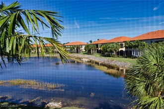 11312 Monte Carlo Boulevard in Bonita Springs, FL - Foto de edificio - Building Photo